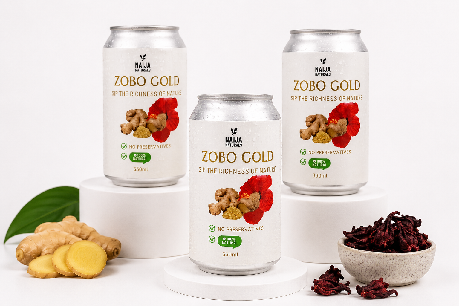 Three 330ml Naija Naturals Zobo Gold cans with hibiscus and ginger