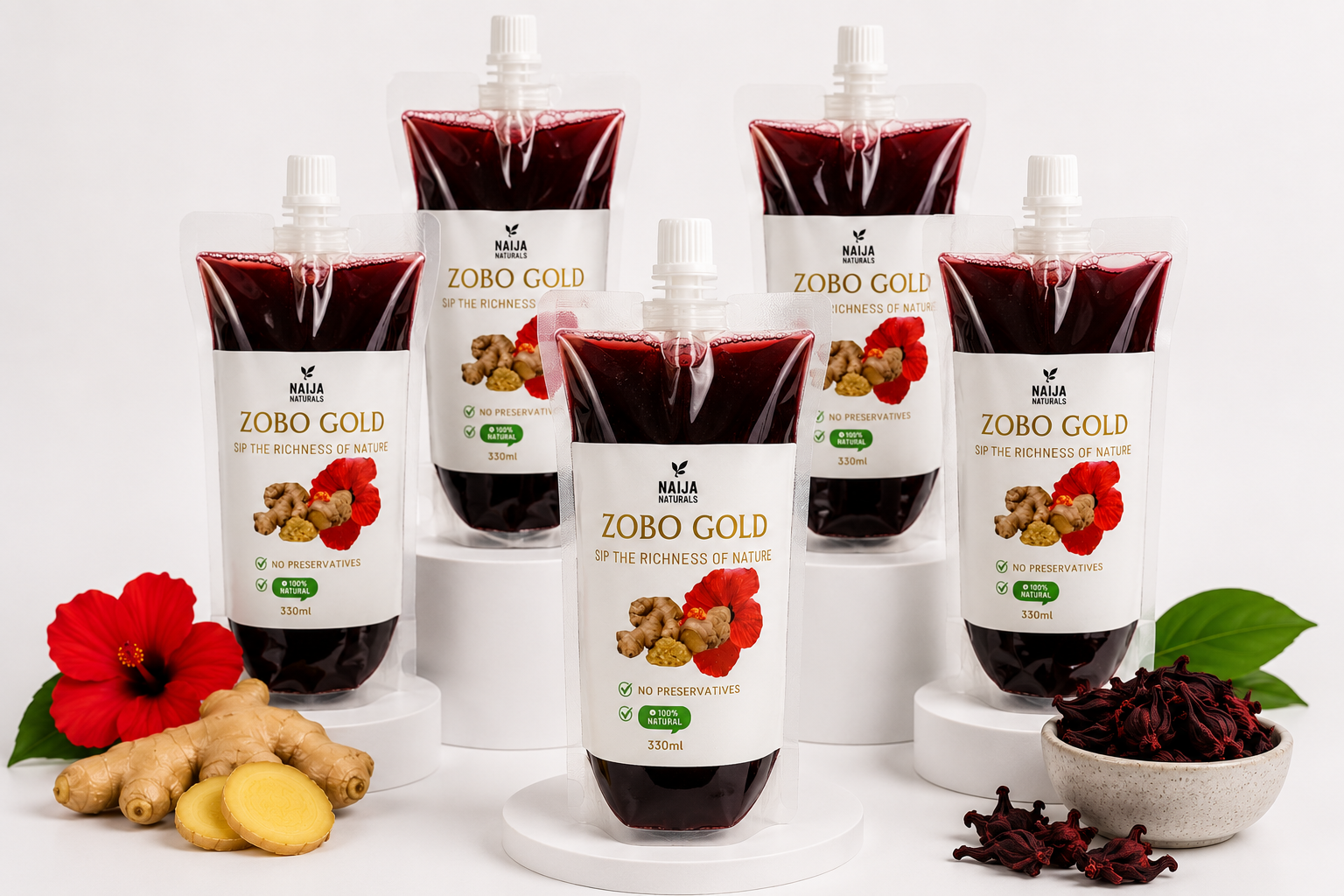 Six 330ml Naija Naturals Zobo Gold spout pouches with hibiscus and ginger